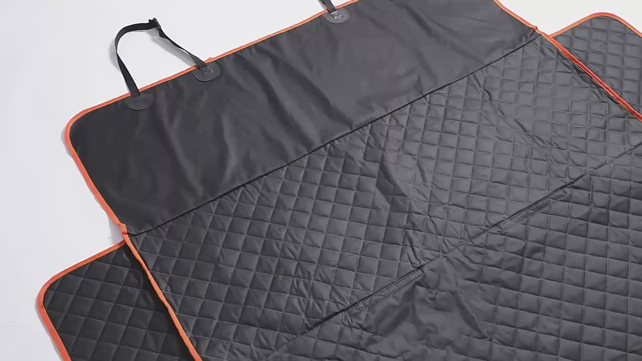 Cargar video: Funda protectora para asiento de coches